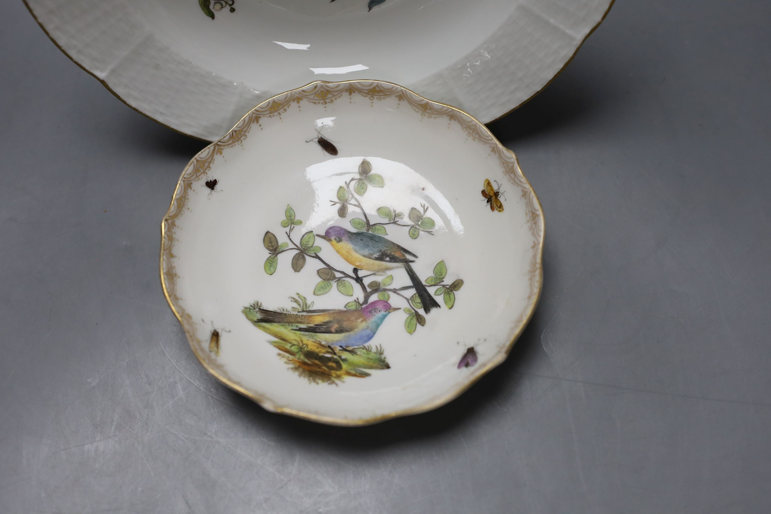 A Meissen Deutsche Blumen soup plate, c.1750 and a 19th-century Meissen outside decorated saucer (2)